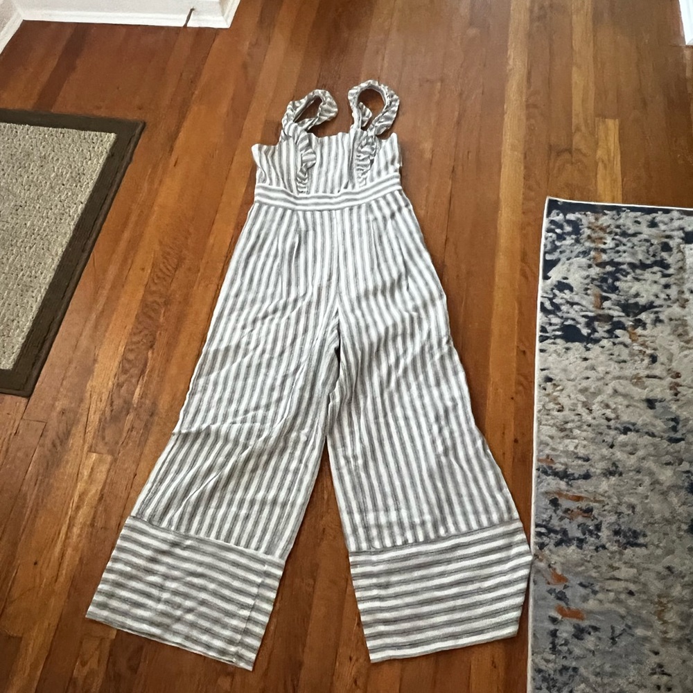 White and navy striped romper, ruffles on straps, flare bottom